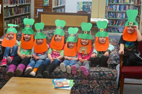The children at story time want to wish everyone a happy St. Patrick's Day. They made quite the craft today in spirit of the holiday! Pictured, from left are: Laityn Johnson, Hilary Ray, Josie Peterson, Brylee Ahrens, Blaise Hartwell, Sabrina Rost, Avery Christensen and Paxton Miller. Not pictured is Celeste Rost, she was shy. Photo Credit/Denise Gilliland, Editor and Chief, Kat Country Hub. 